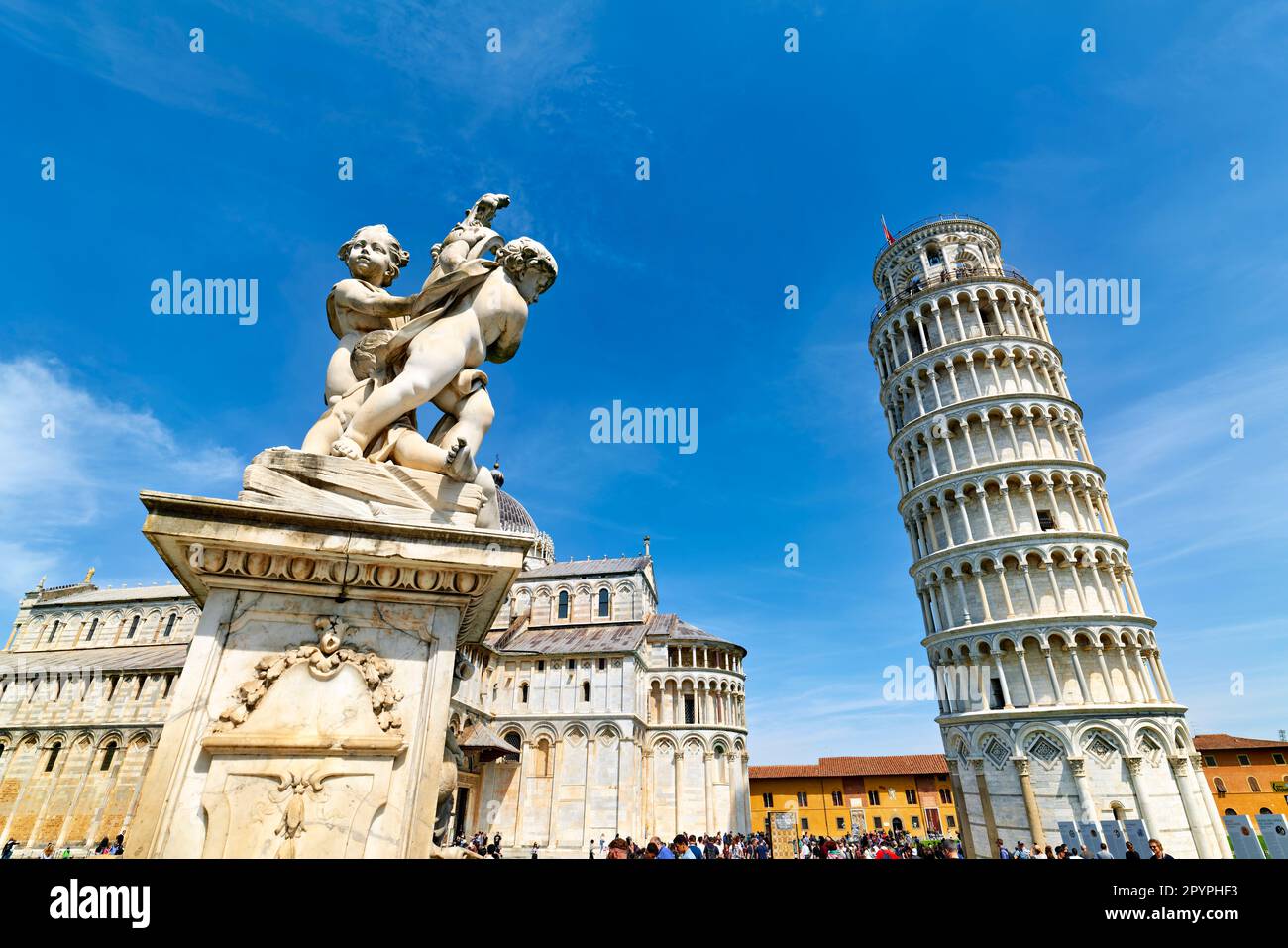 Pisa Tuscany Italy. Piazza dei Miracoli (Square of Miracles). The Leaning Tower and fontana dei putti (fountain of the angels) Stock Photo