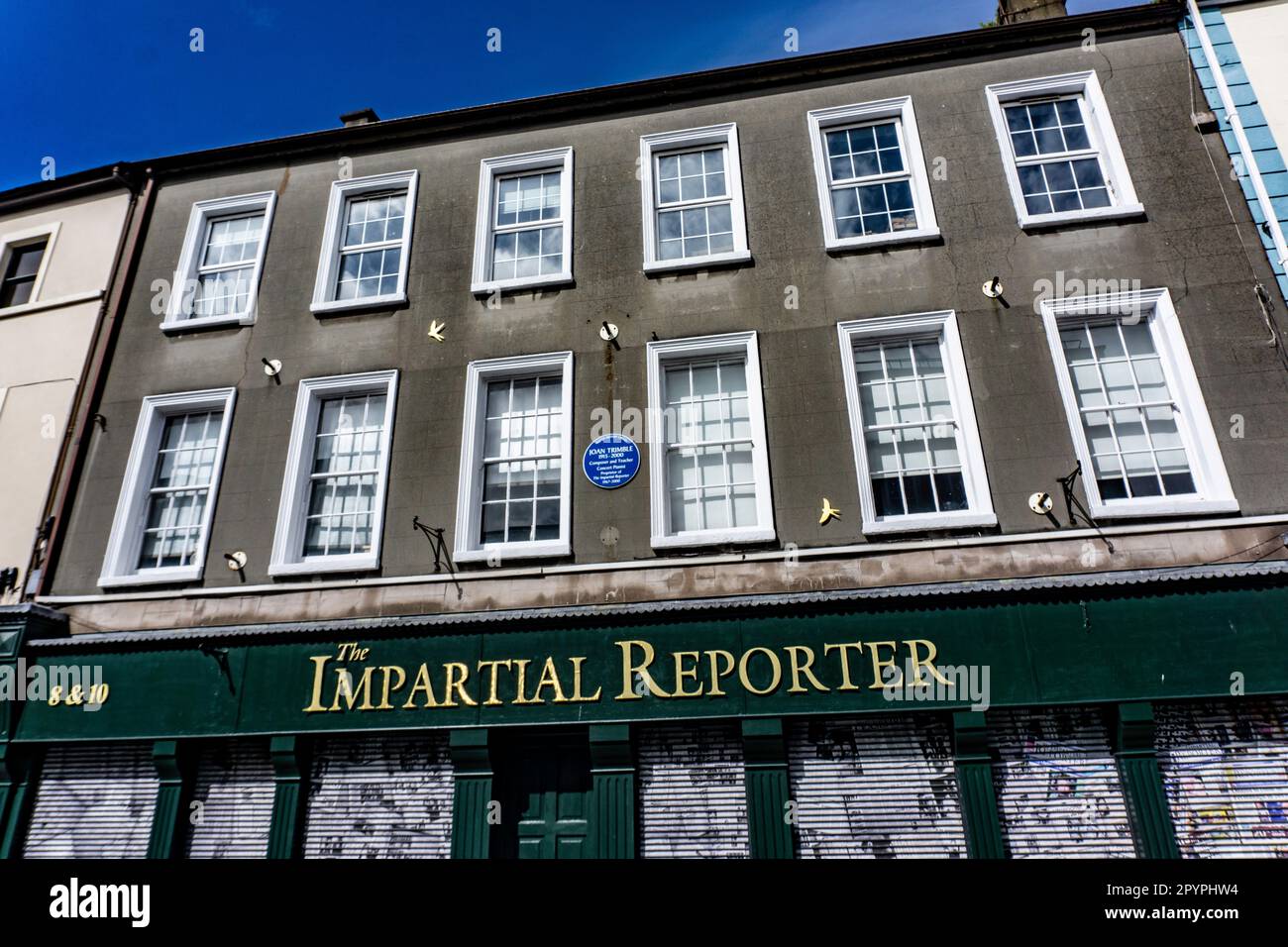 The Offices of The Impartial Reporter, founded in 1825, it is the 3rd oldest newspaper in Ireland. The plaque refers to Joan Trimble, former owner. Stock Photo