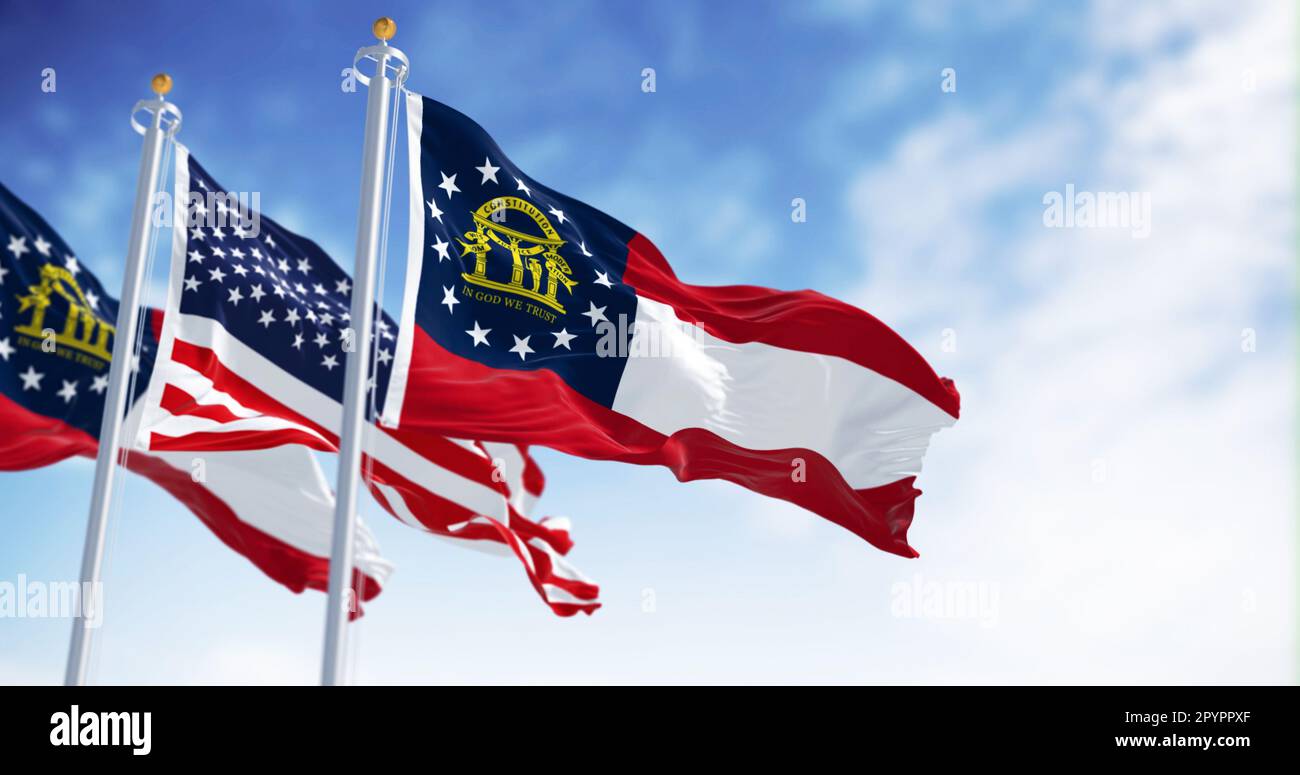 The flags of Georgia and United States waving in the wind on a clear day. Georgia is a state in the southeastern US. US federate state. 3d illustratio Stock Photo