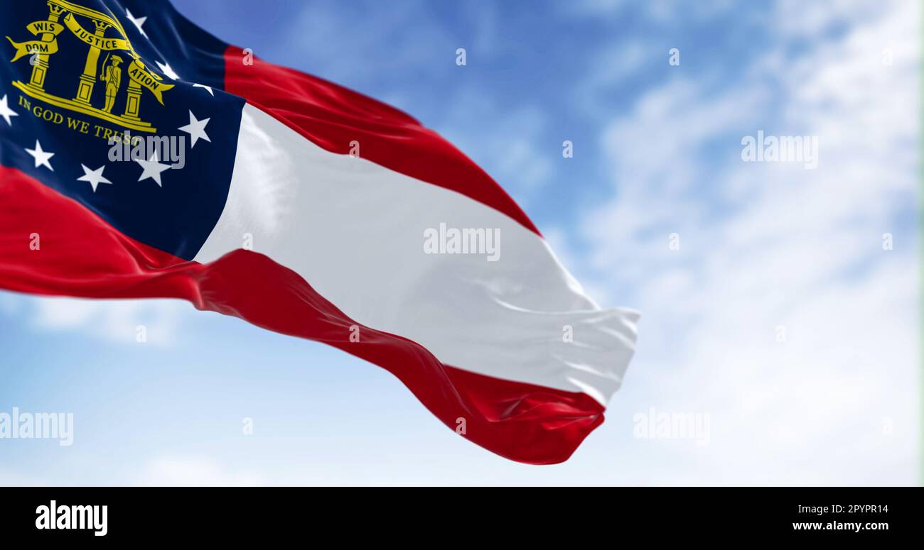 The state flag of Georgia waving in the wind on a clear day. Georgia is a state in the southeastern US. US federate state. 3d illustration render. Sel Stock Photo