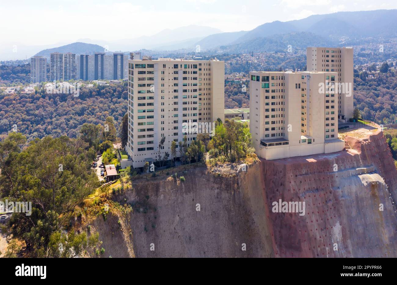 Precariously positioned high-rise buildings in the Santa Fe area of Mexico City, Mexico Stock Photo