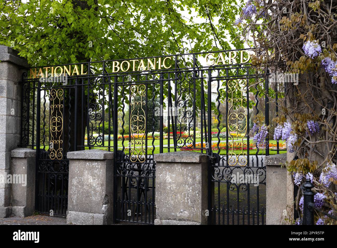 Sign and fence at the entrance to the National Botanic Gardens in Dublin, Ireland. Stock Photo
