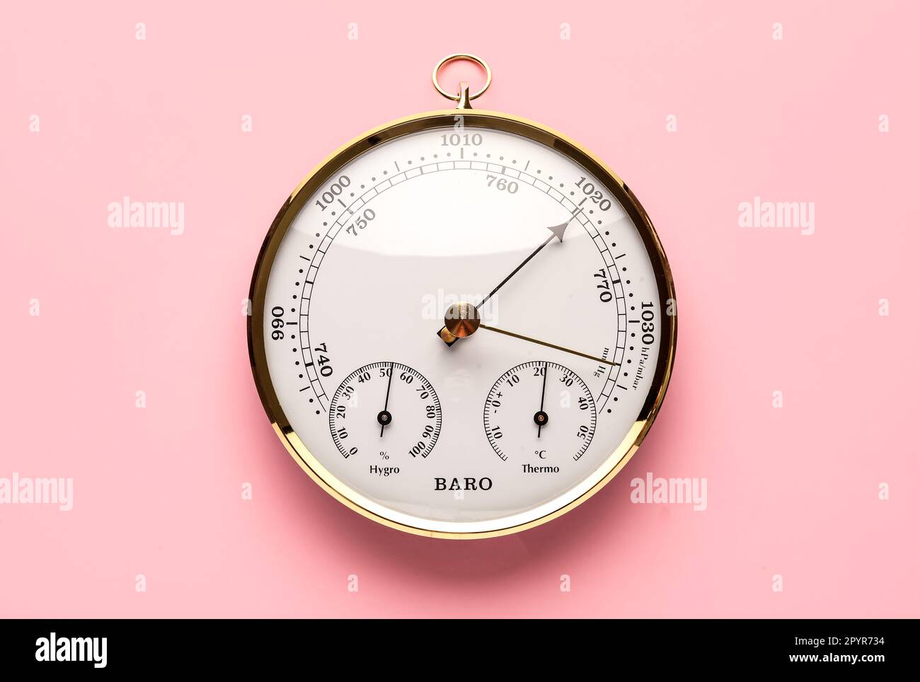 Aneroid barometer on pink background Stock Photo Alamy