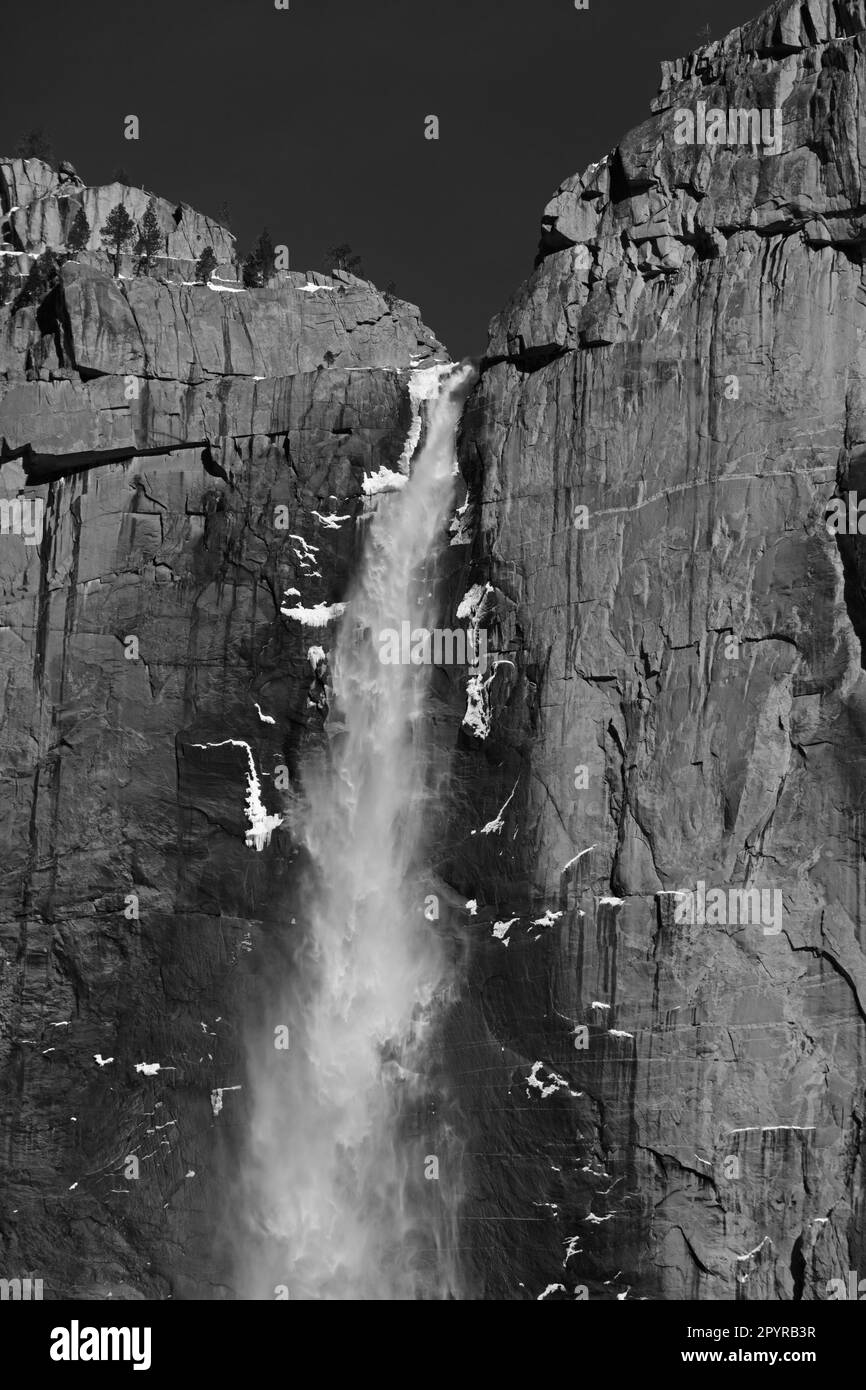 Yosemite Falls in Yosemite Valley after a  winter snow - California Stock Photo