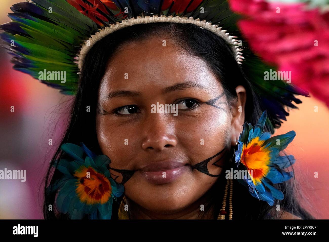 An Indigenous woman attends the closing of the annual Terra Livre, or