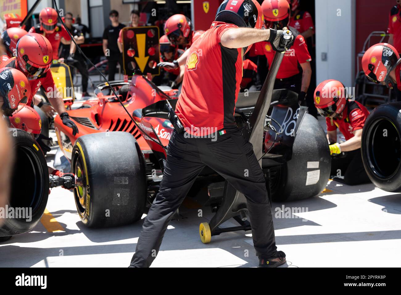 Miami, Florida, USA. 4th May, 2023. Scuderia Ferrari mechanics and team members practice a pit