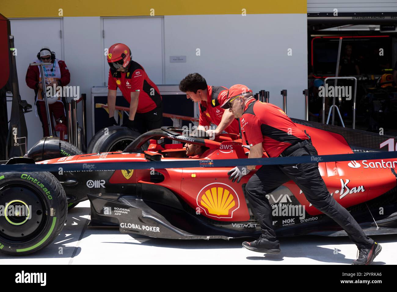 Miami, Florida, USA. 4th May, 2023. Scuderia Ferrari mechanics and team members practice a pit