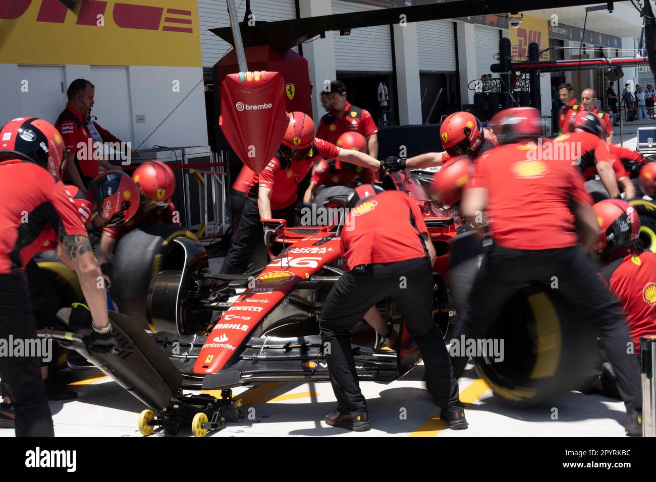 Miami, Florida, USA. 4th May, 2023. Scuderia Ferrari mechanics and team members practice a pit
