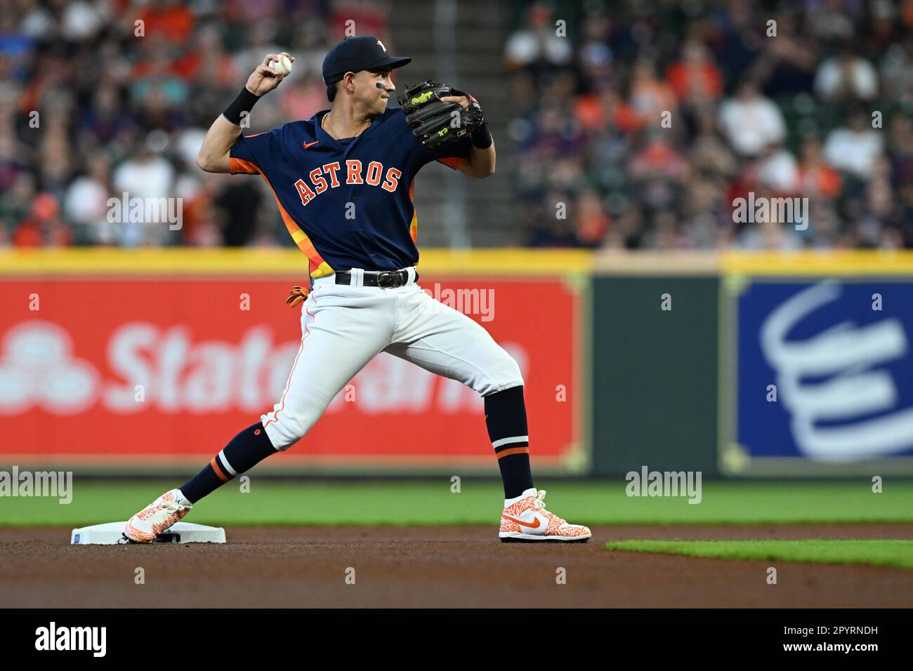 Houston Astros second baseman Mauricio Dubon (14) prepares for the game  against the Colorado Rockies. The Astros defeated the Rockies 4-1,  Wednesday, July 19, 2023, in Denver. (Margaret Bowles via AP Images Stock  Photo - Alamy
