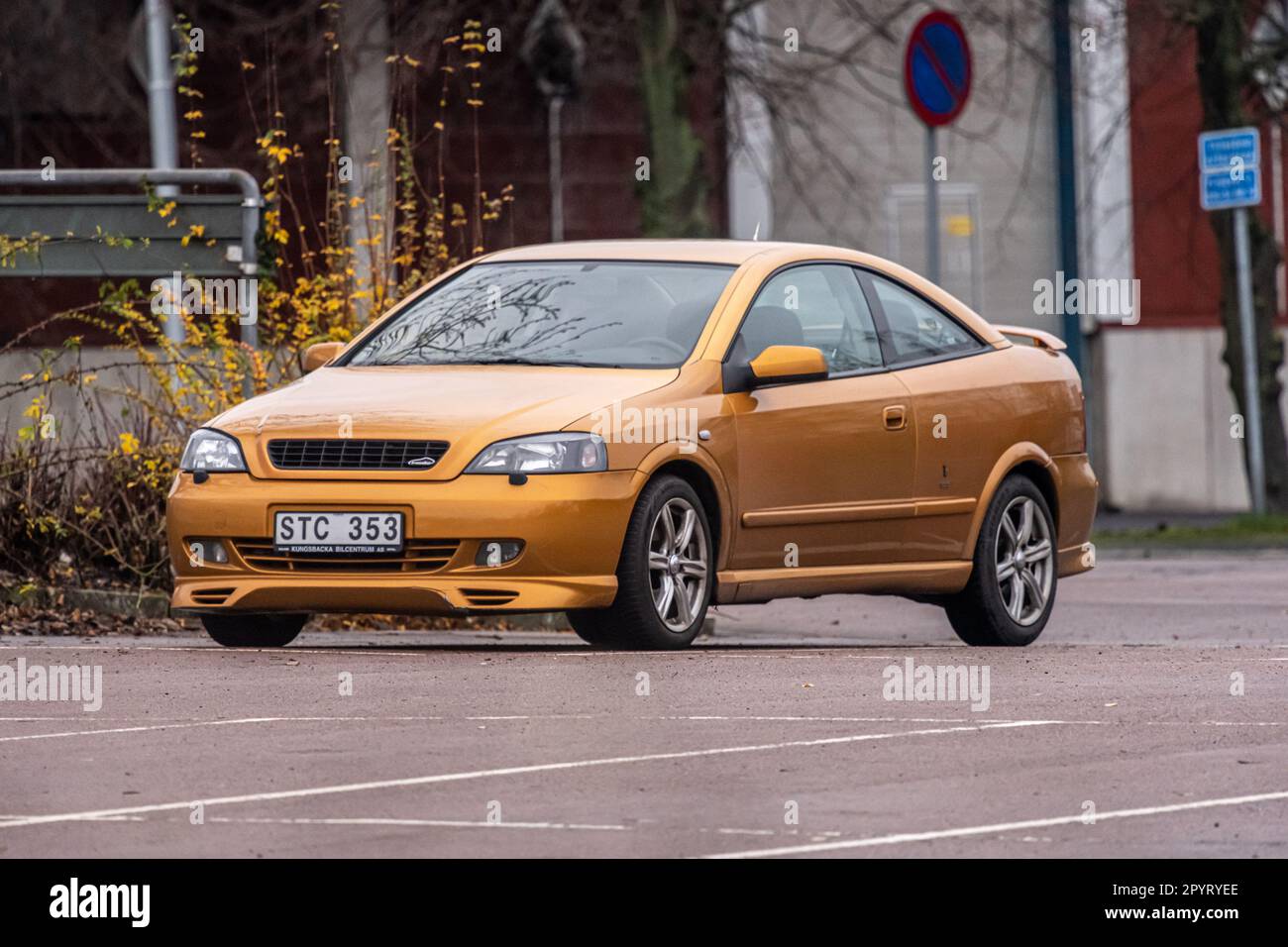 Gothenburg, Sweden - november 13 2022: Golden brown 2000 Opel Astra coupe Stock Photo