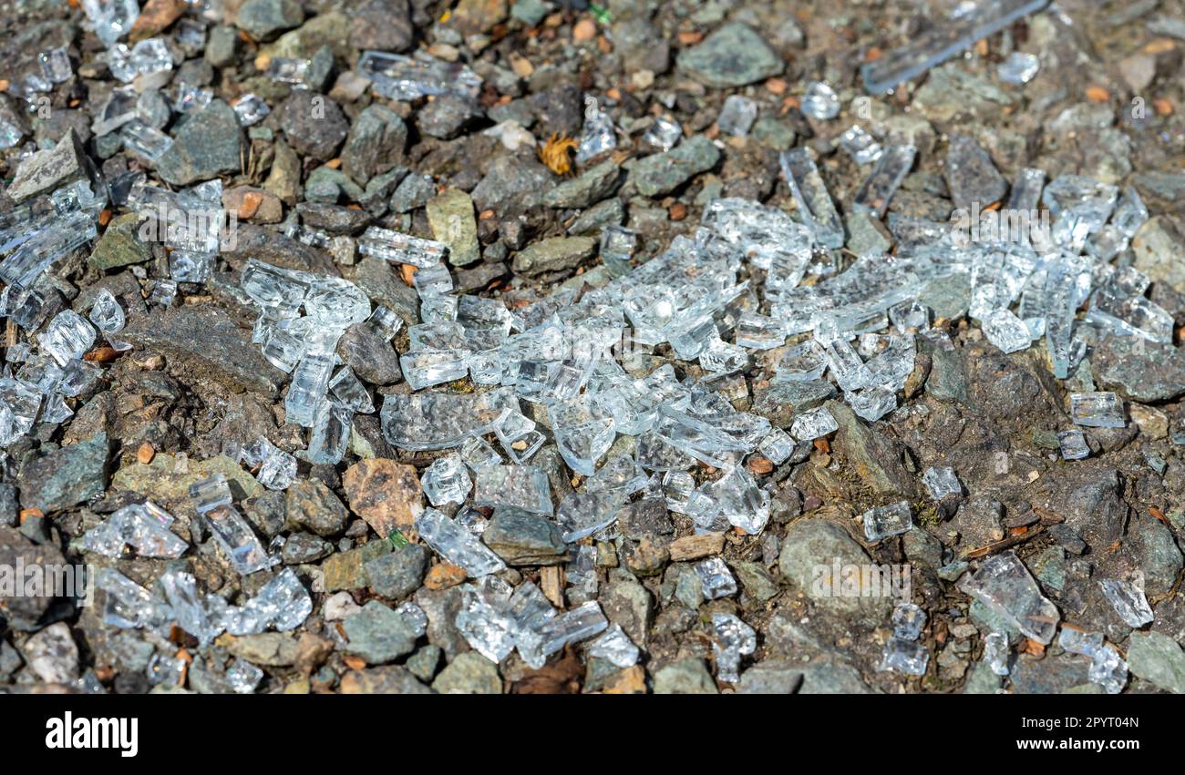 Cycle path broken glass vandalism Stock Photo