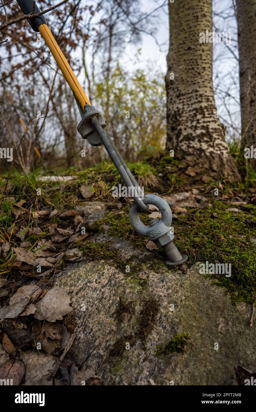 Gothenburg, Sweden - december 06 2022: Bolt and wire tensioner securing a power pole Stock Photo