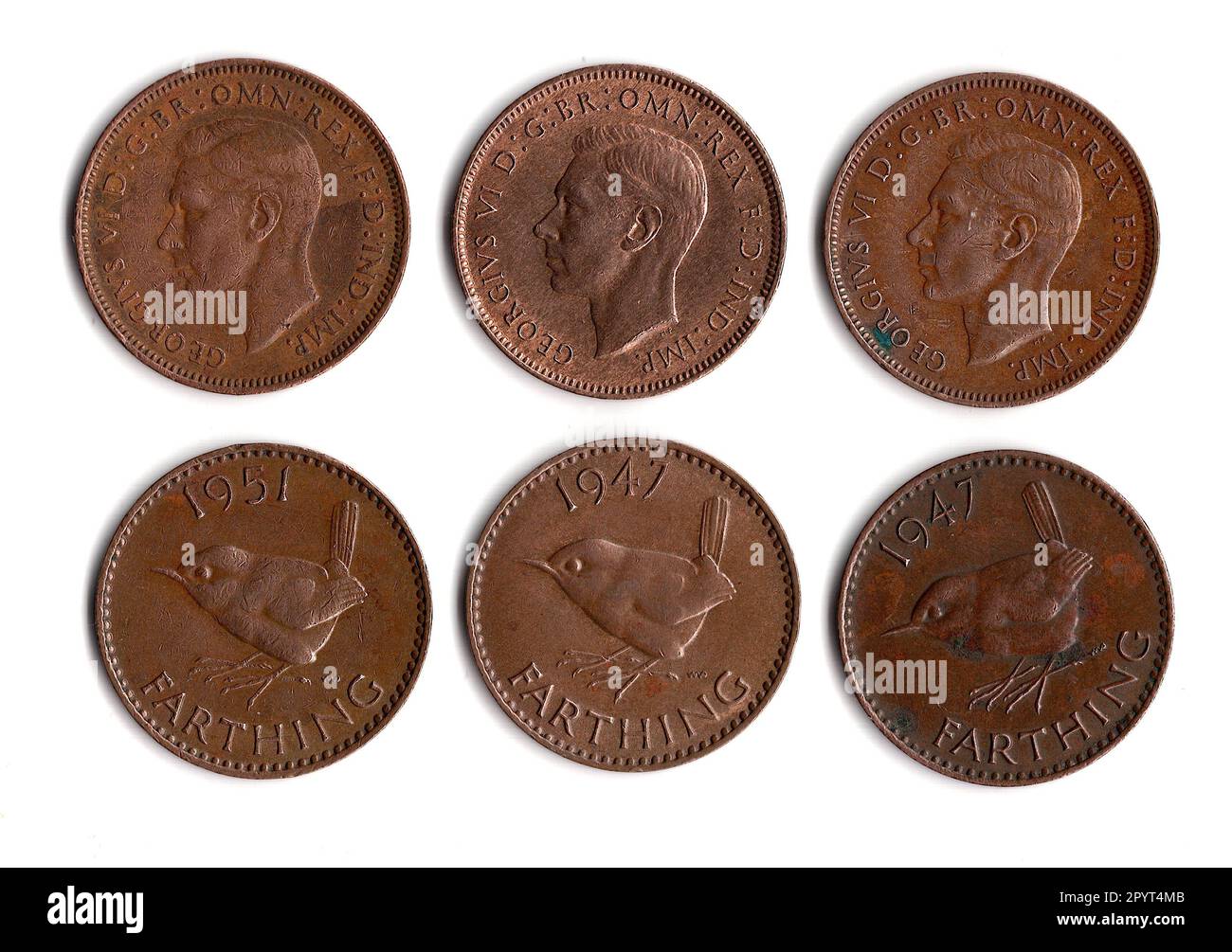 King George VI vintage farthings from Great Britain showing the front and reverse. Stock Photo