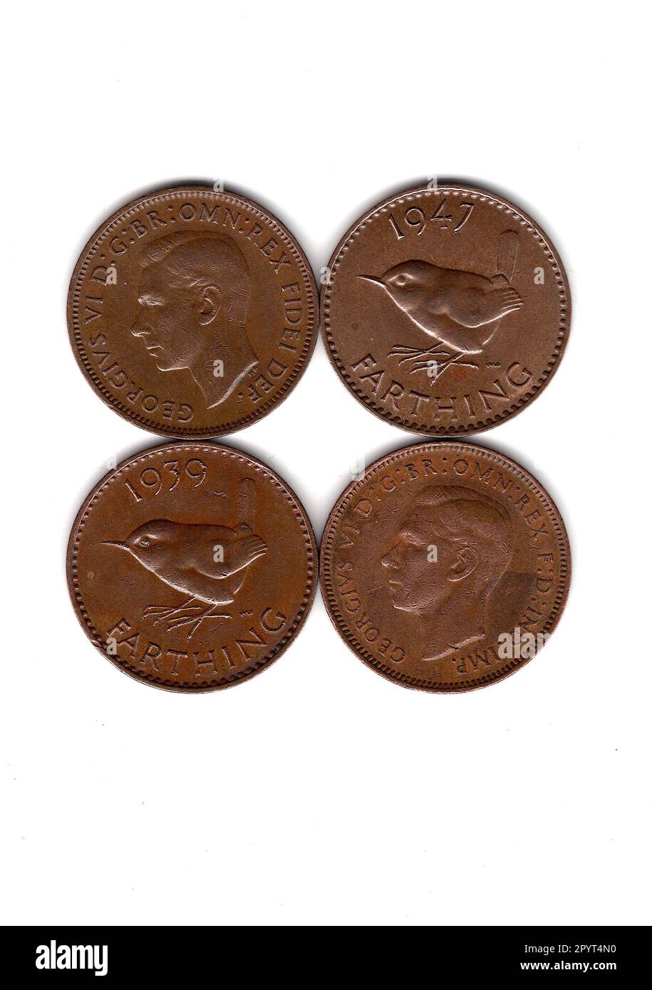 King George VI vintage farthing coins from Great Britain showing the front and reverse. Stock Photo