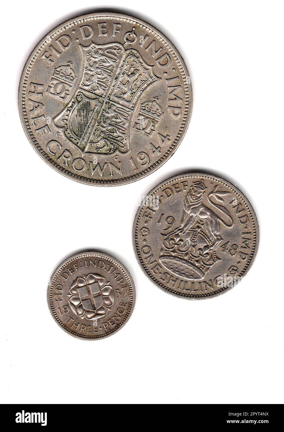 King George VI vintage silver coins from Great Britain showing the reverse. Stock Photo