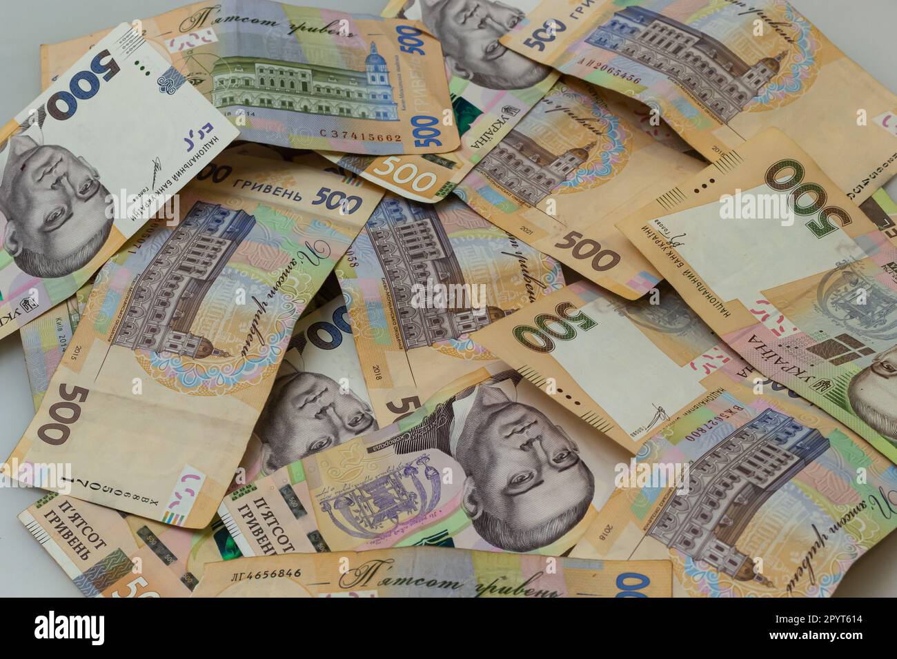 Money of Ukraine. Background of ukrainian hryvnia banknotes. Hryvnia 500, 200. Uah. Money and save concept. Stock Photo