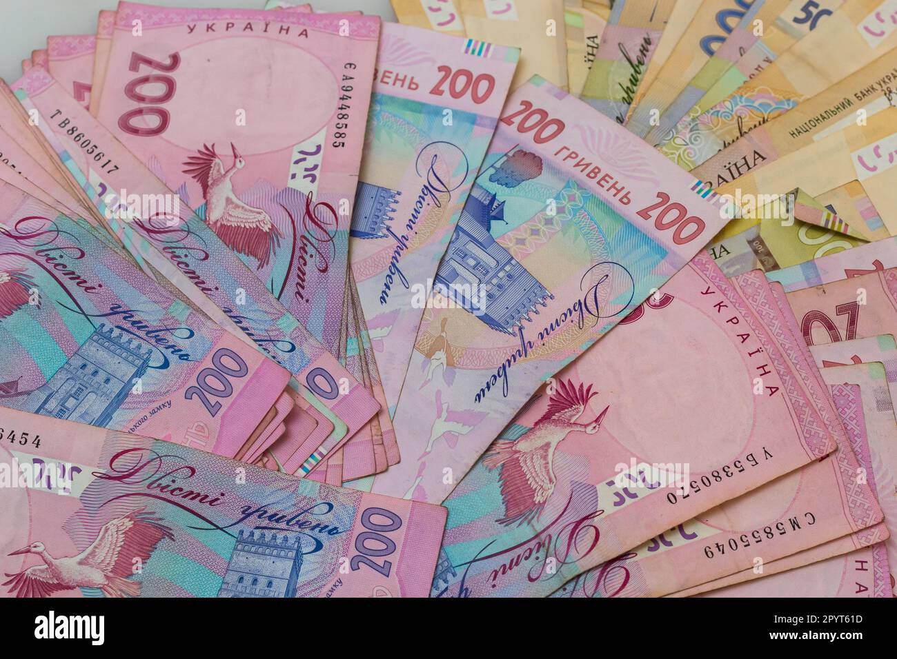 Money of Ukraine. Background of ukrainian hryvnia banknotes. Hryvnia 500, 200. Uah. Money and save concept. Stock Photo