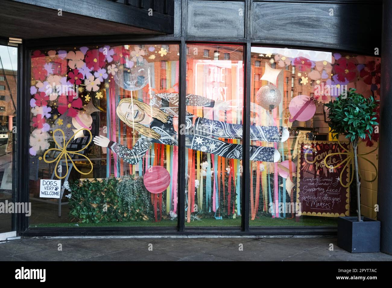 A shop window in Liverpool is decorated for the Eurovision song contest Stock Photo