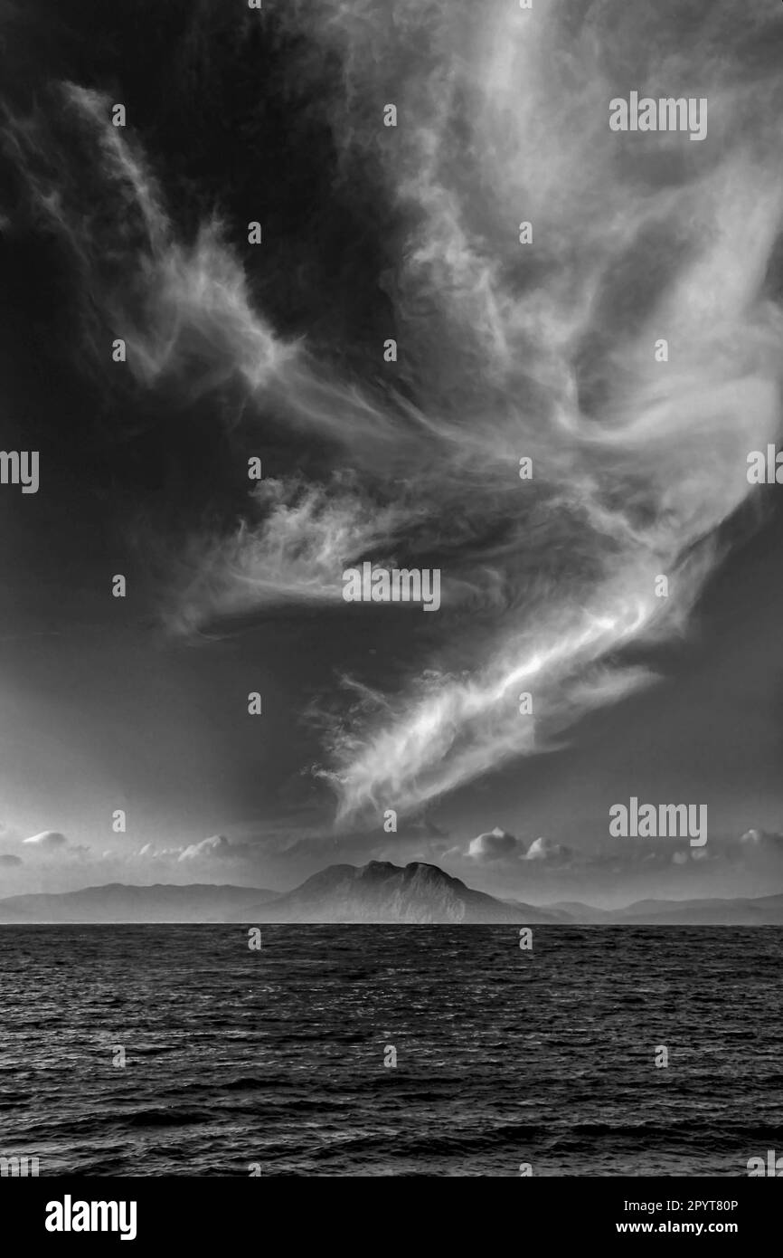 Dark island in sea Black and White Stock Photos & Images - Alamy