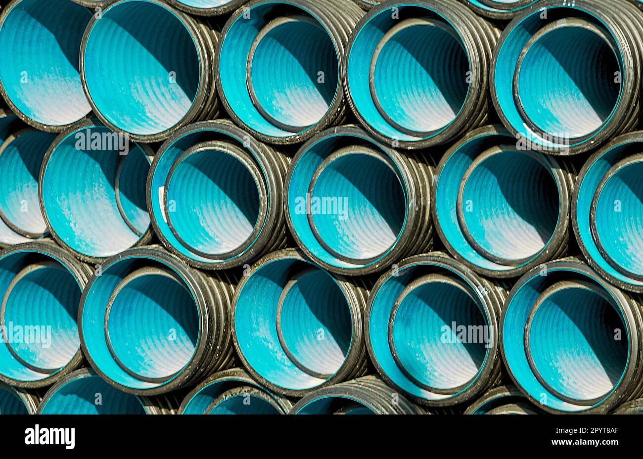 PVC pipes staked in construction site Stock Photo - Alamy
