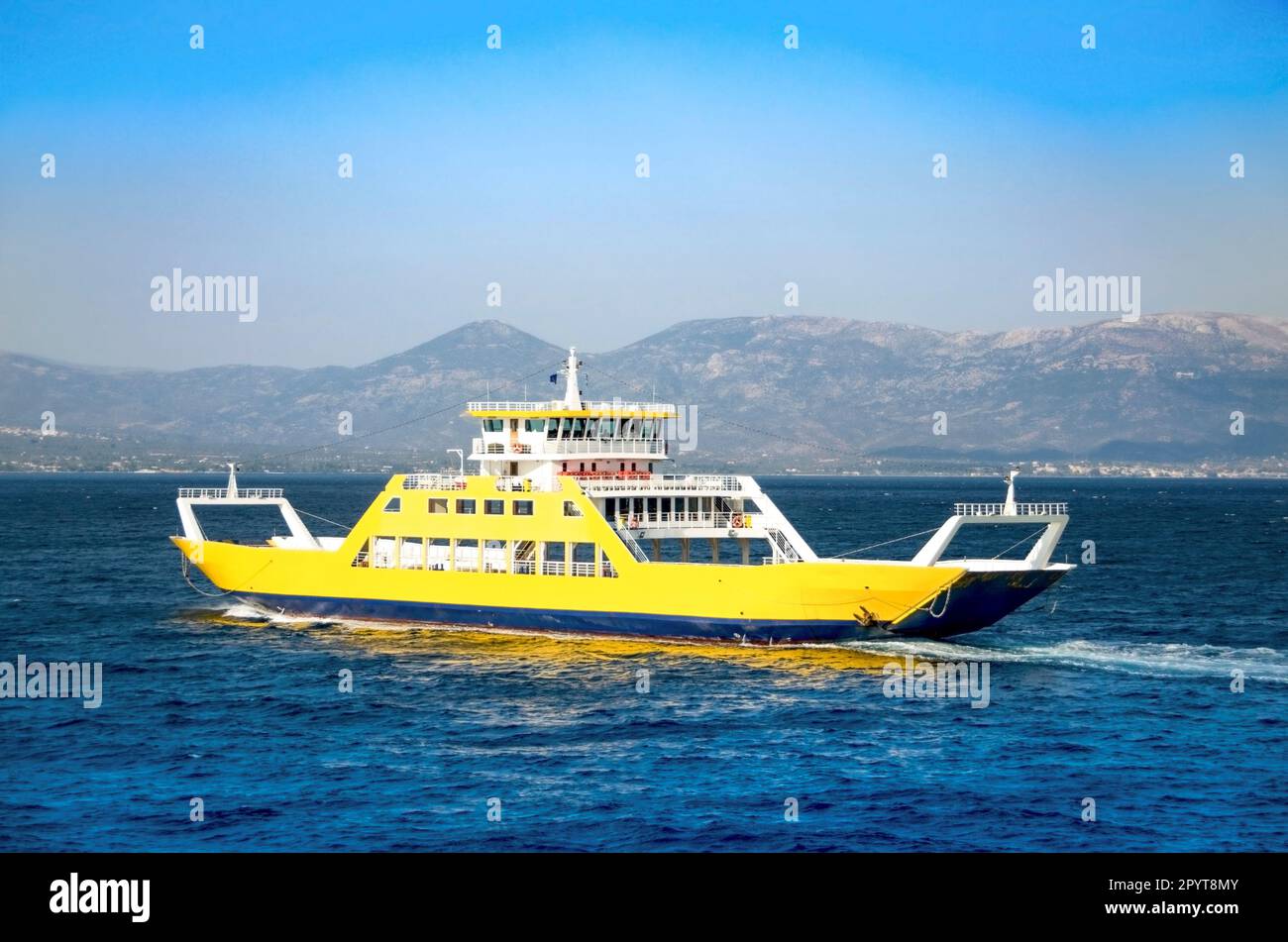 Yellow ferry boat for the transport of people and cars Stock Photo Alamy