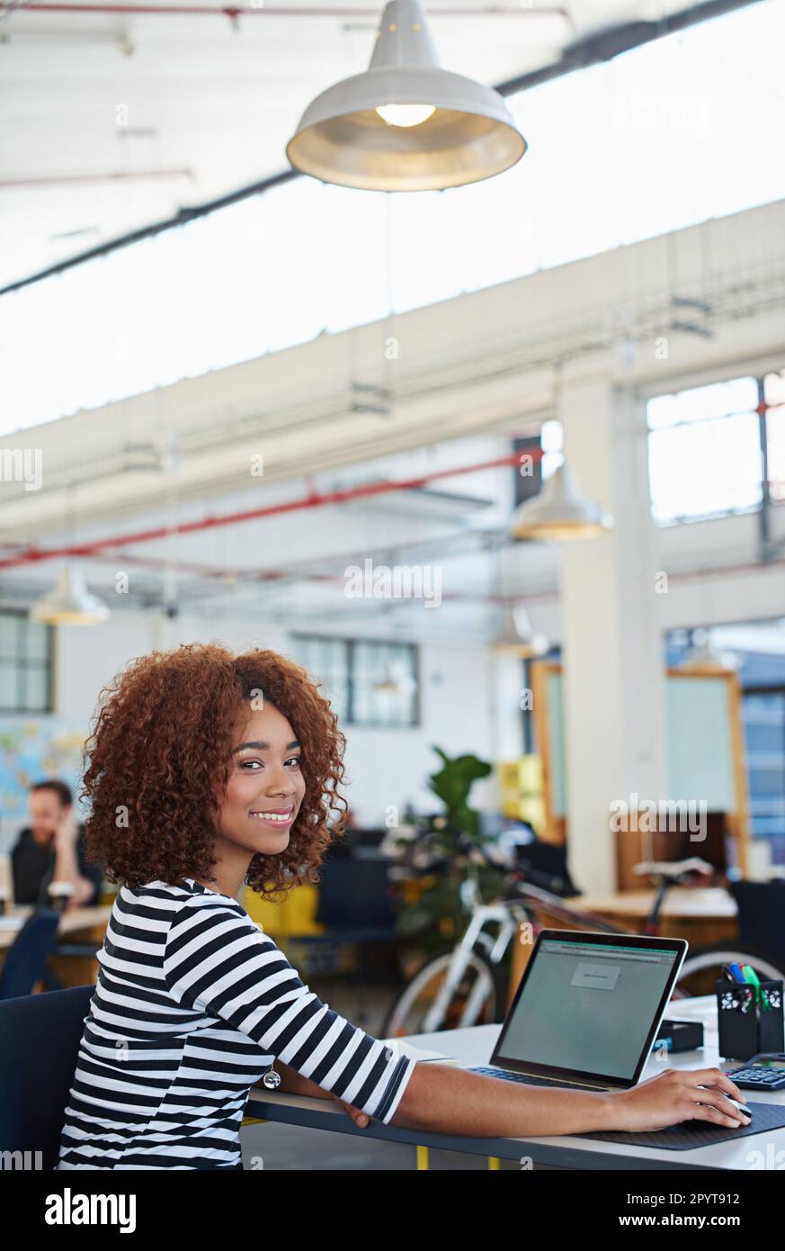 Developing tomorrows tech today. a designer at their workstation in an office. Stock Photo