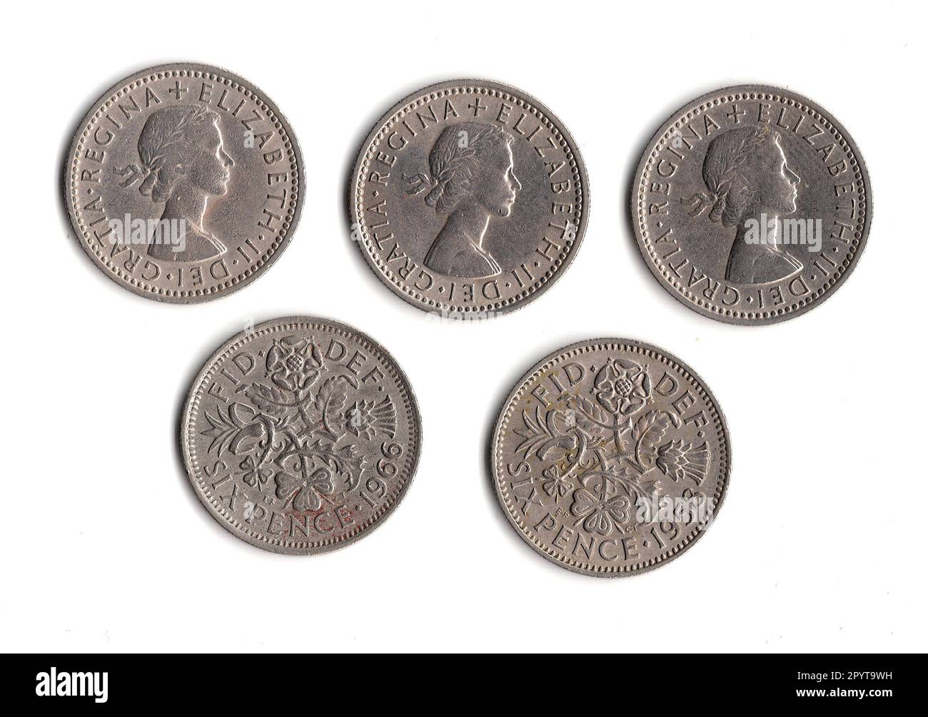 Queen Elizabeth II vintage six pence pieces from Great Britain showing the front and reverse. Stock Photo