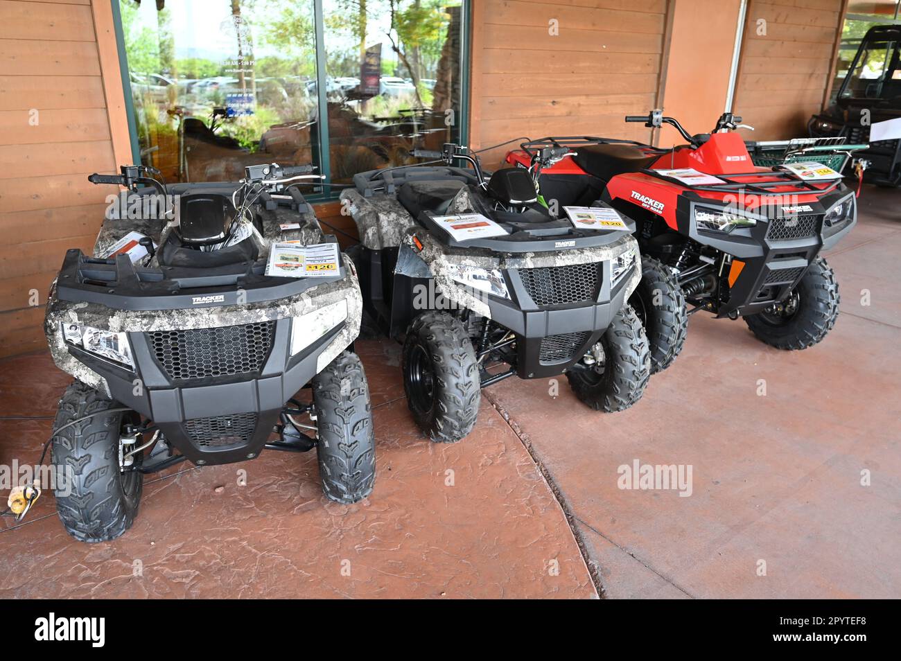 Tracker ATV's for sale at Outdoor World in Las Vegas Stock Photo Alamy