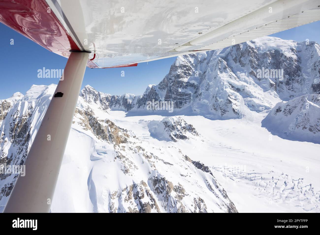 Glacier from airplane window over Mountain Denali Stock Photo