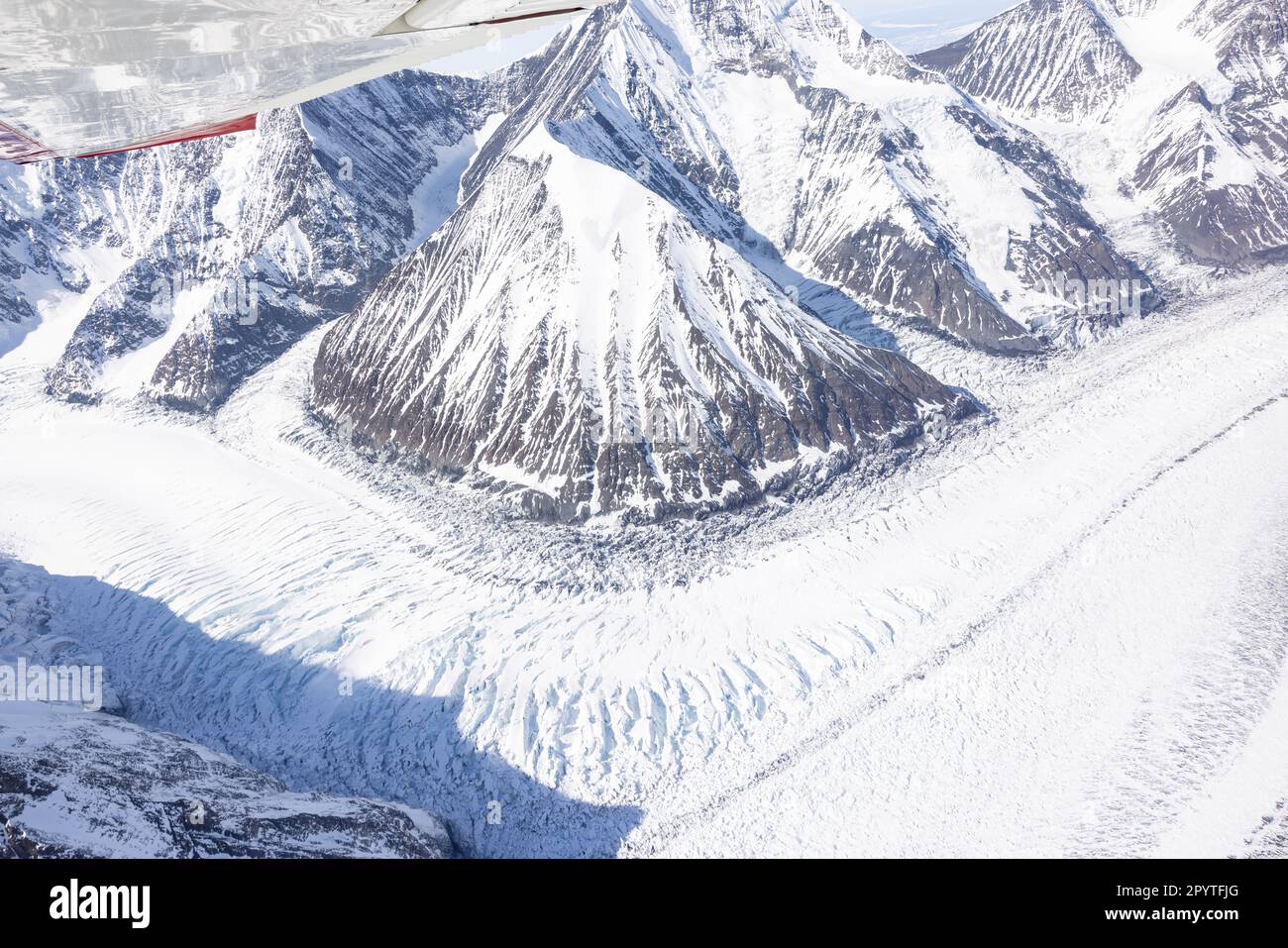 Glacier from airplane window over Mountain Denali Stock Photo