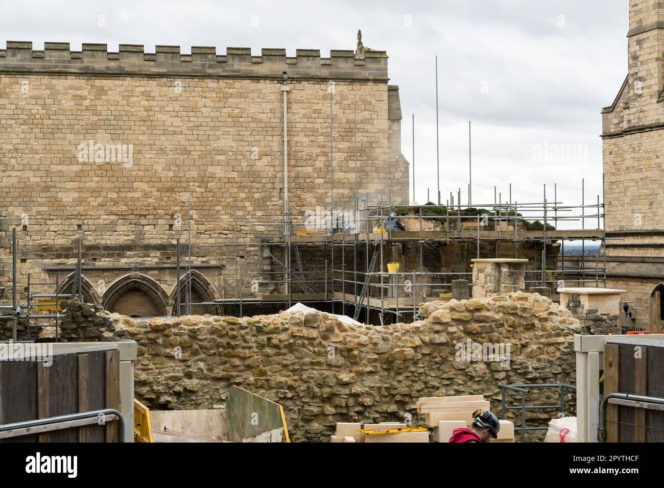 Workmen on scaffolding carrying out preservation work on Lincoln medieval Bishops Palace, Old town Lincoln city 2023 Stock Photo
