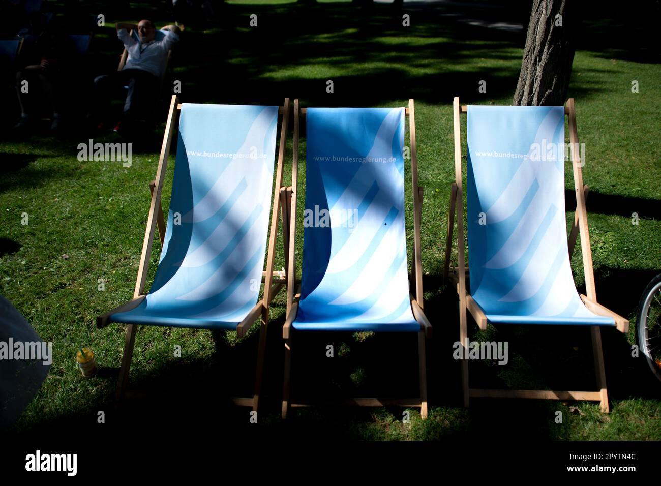 Deckchairs with the federal government logo at the Open Day under the motto Democracy invites the federal government in the Federal Chancellery in Berlin, Germany. Stock Photo