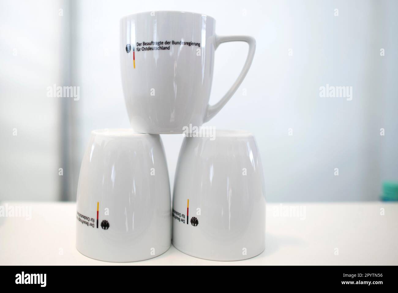 Cup with Logo at the Stall of the Parliamentary State Secretary for East Germany and Equivalent Living Conditions SPD on the day of the German government's weekend Open Day, which was attended by other members of the German government with the slogan Demokratie laedt ein at the Chancellery Office in Berlin, Germany. Stock Photo