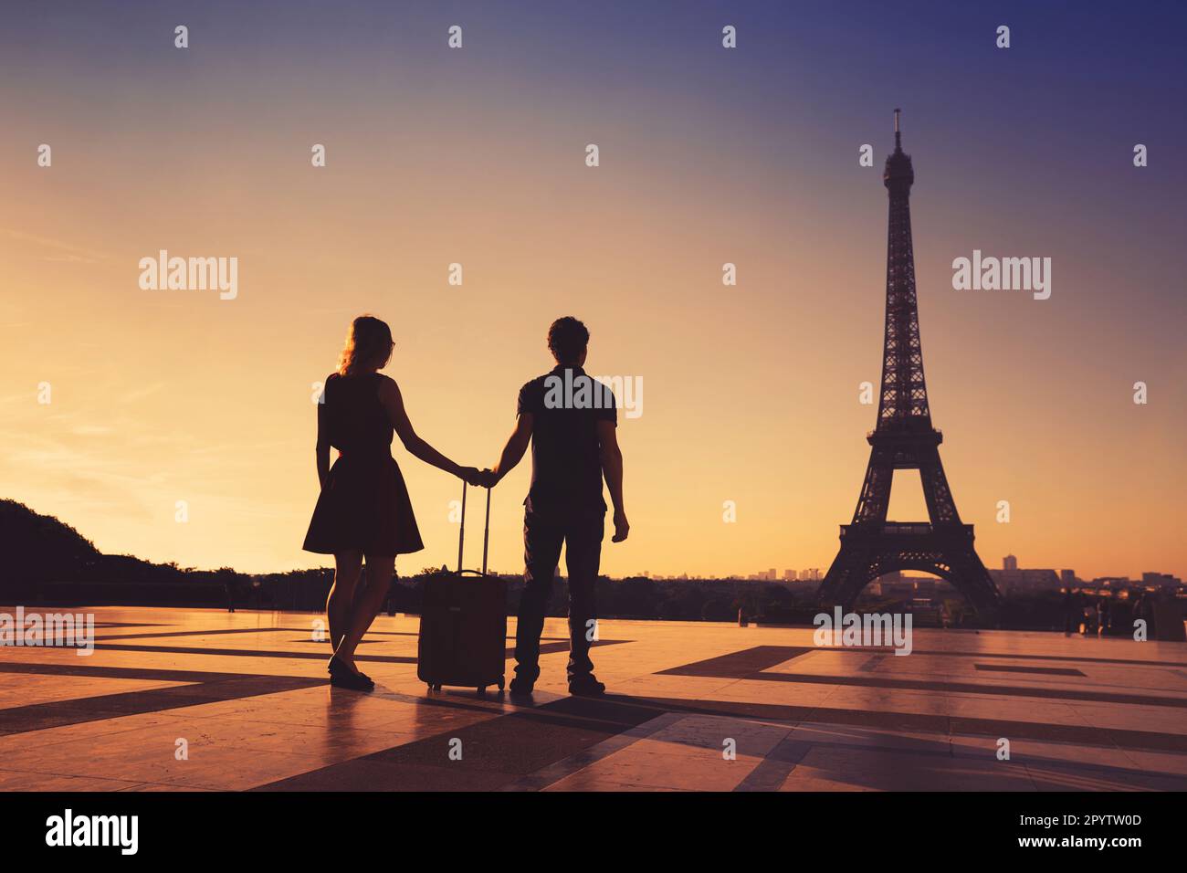 silhouette of couple of tourists in Paris, romantic getaway travel in France Stock Photo