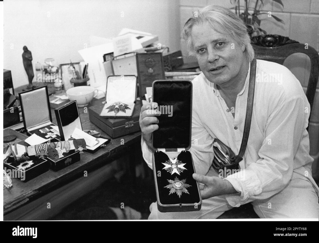 "Gallery owner Jochen Michaelis with the ""Order of the Red Eagle