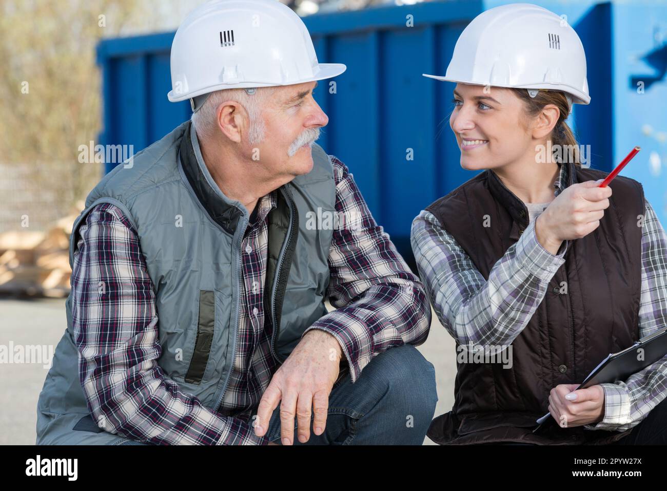 workers having a conversation outdoor Stock Photo