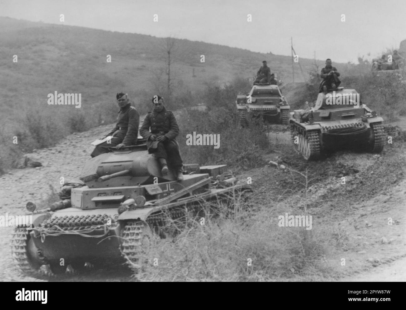 Tank II of the 9th Panzer Division in the mountains during the campaign against Yugoslavia. Photo. Worm. [automated translation] Stock Photo