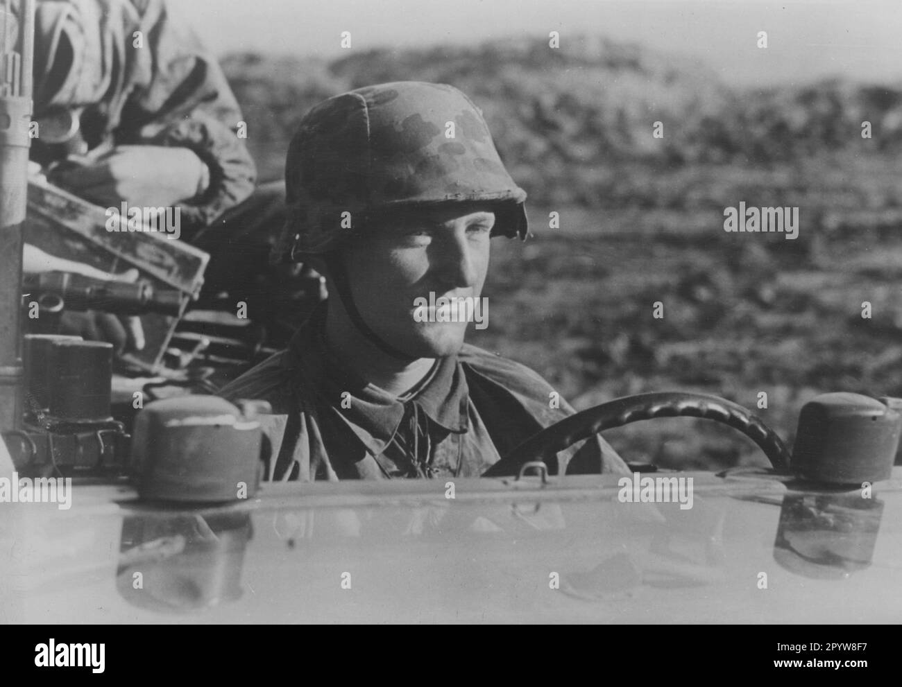 Soldiers of the Leibstandarte-SS Adolf Hitler in Volkswagen Kübelwagen on the Eastern Front. Photo: Roth [automated translation] Stock Photo