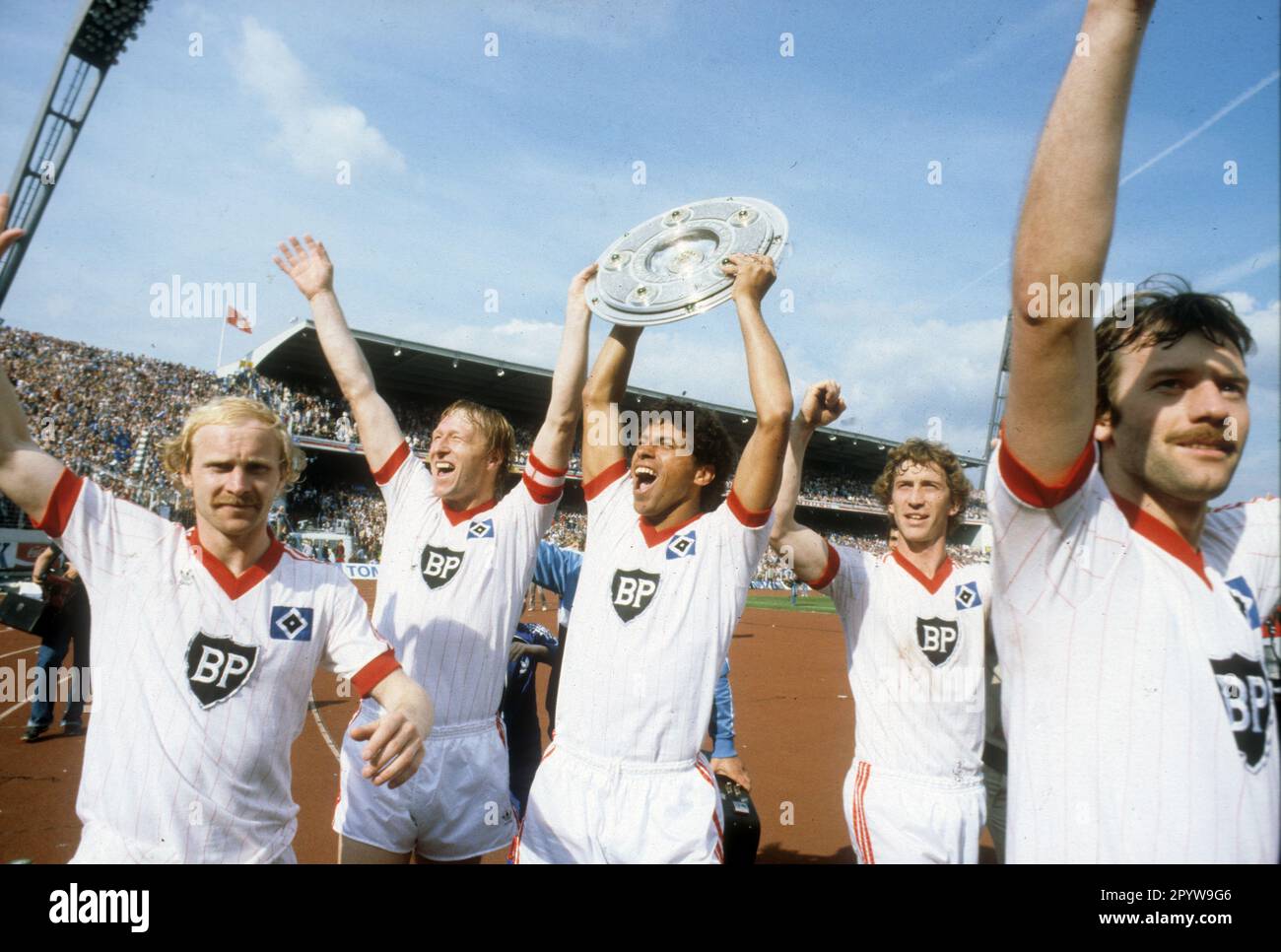 FB - BL , 34. matchday , Hamburger SV - Karlsruher SC 3:3 /29.05.1982/ Jubel HSV from left Lars Bastrup, Horst Hrubesch , William -Jimmy- Hartwig with championship trophy . Ditmar Jakobs and Holger Hieronymus For journalistic purposes only! Editorial use only ! [automated translation] Stock Photo