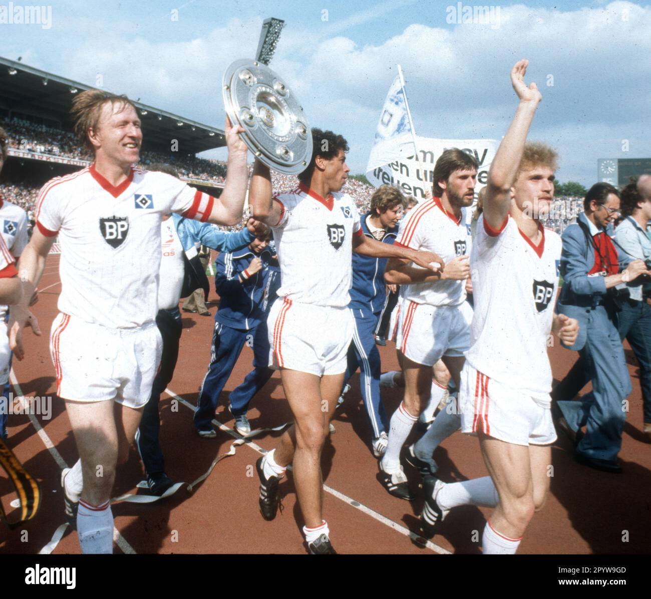 FB - BL , 34. matchday , Hamburger SV - Karlsruher SC 3:3 /29.05.1982/ Jubel HSV from left : Horst Hrubesch and William -Jimmy- Hartwig with championship trophy, Manfred Kaltz and Thomas von Heesen For journalistic purposes only! Editorial use only ! [automated translation] Stock Photo