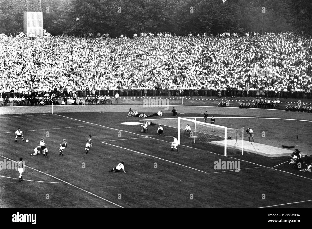 Partial view of the Rheinstadion in Düsseldorf during the international match between Germany and Denmark on 20.09.1961. In the penalty area from left: Brülls, Haller and Herrmann. For journalistic use only! Only for editorial use! [automated translation] Stock Photo