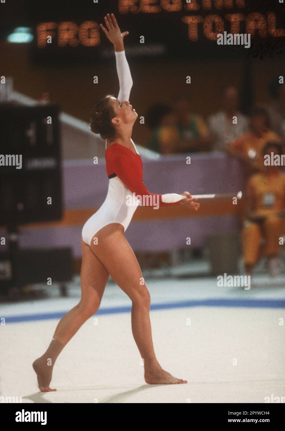 Olympic Games 1984 in Los Angeles. Rhythmic gymnastics: Regina Weber (FRG) action, clubs, 11.08.1984. [automated translation] Stock Photo