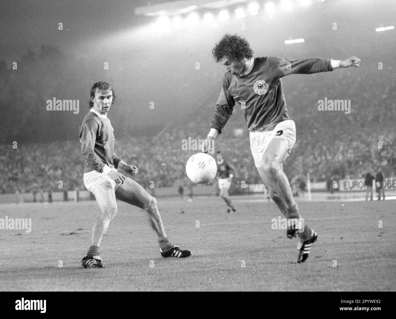 Soccer World Cup 1974 2nd round / BR Germany - Sweden 4:2 / 30.06.1974 in Duesseldorf / Paul Breitner in action, left Bernd Hölzenbein looks on [automated translation] Stock Photo