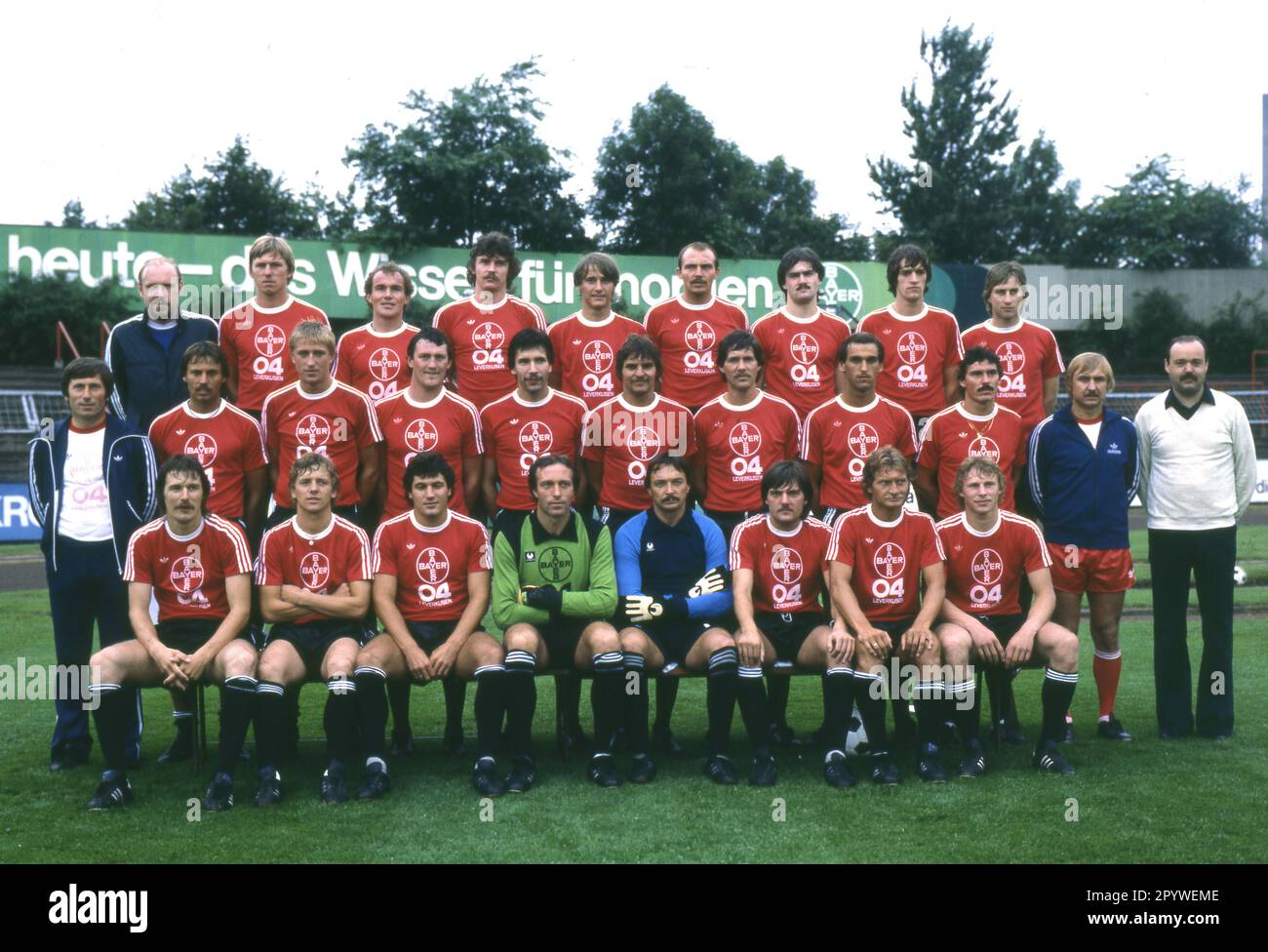 Bayer 04 Leverkusen lineup for the 1979/80 season. Back row from left: Masseur Trzolek, Matthias Brücken, Kurt Eigl, Dietmar Demuth, Schmid, Klaus Schulze, Knauf, Hans-Jürgen Scheinert and Peter Klimke. Middle row from left: Coach Willibert Kremer, Harry Gniech, Norbert Ziegler, Meul, Thomas Hörster, Peter Szech, Klaus Bruckmann, Lehr, Jürgen Glowacz, Co-Trainer Kentschke and Manager Heitmann. Front from left: Jürgen Gelsdorf, Franz-Peter Herrmann, Walter Posner, Hubert Makel, Fred Bockholt, Willi Korth, Dieter Herzog and Kurek. For journalistic use only! Only for editorial use! [automated Stock Photo