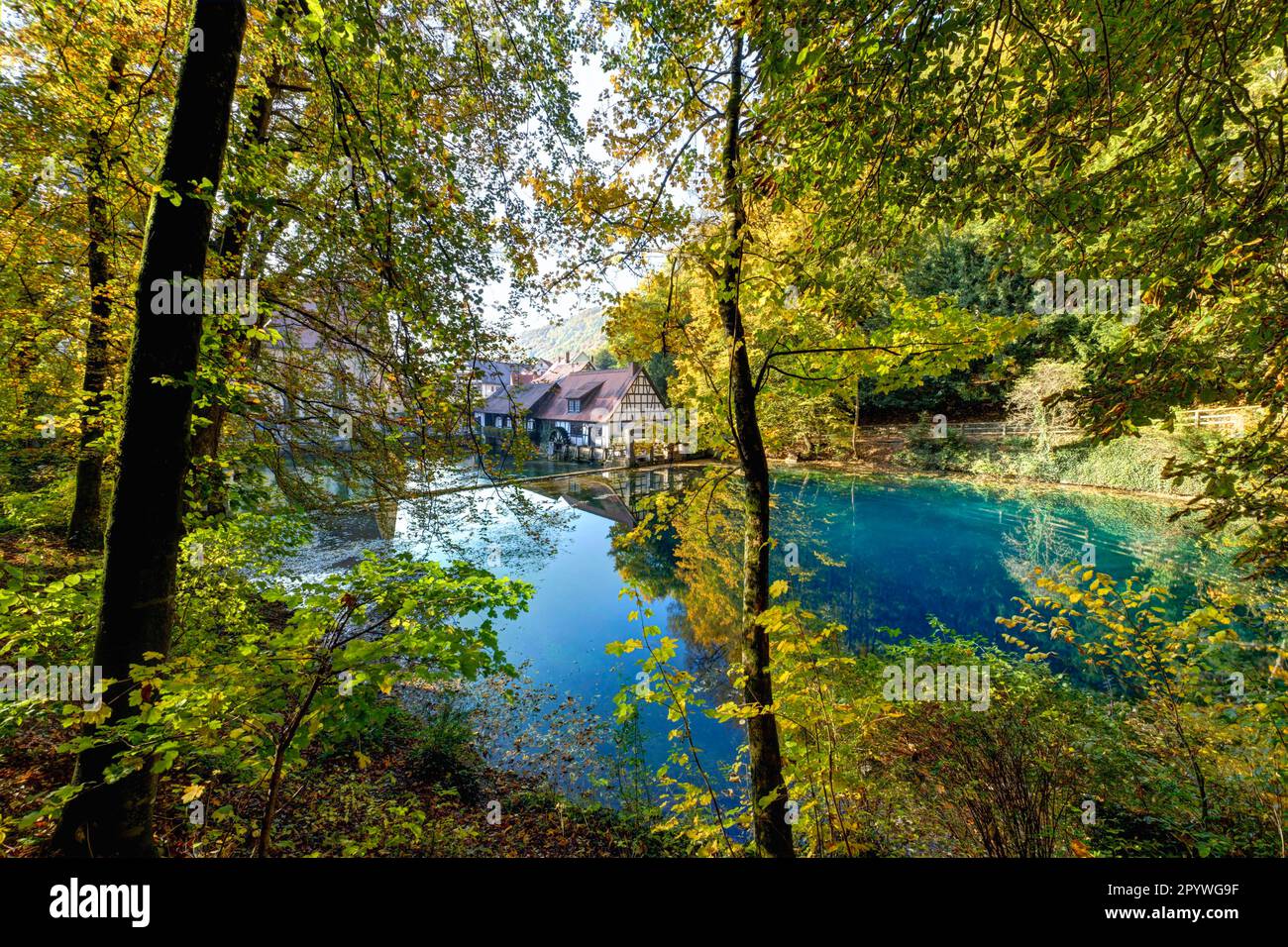 Indian Summer at the Blautopf, karst spring with spring pot on the Swabian Alb, source of the Blau, Blaubeuren, Baden-Wuerttemberg, Germany Stock Photo