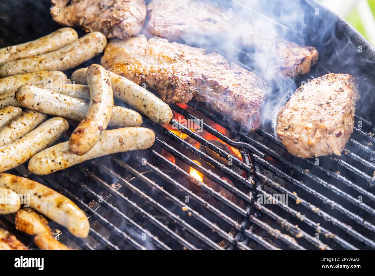 Barbecue in the garden, steaks and sausages on a grill, Stuttgart, Baden- Wuerttemberg, Germany Stock Photo - Alamy