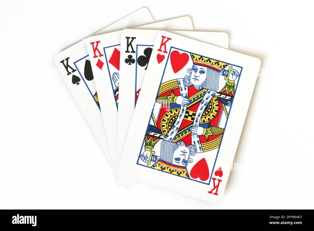 A close-up of four playing cards, forming a Four of a Kind poker hand Stock Photo