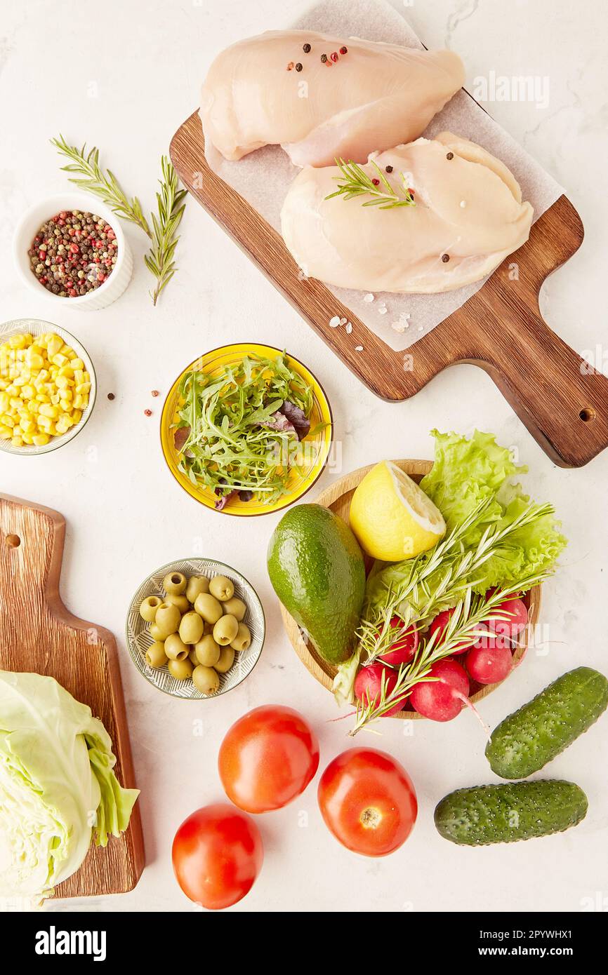 Aesthetics vegetables, fruits, chicken fillet, olives and greens top