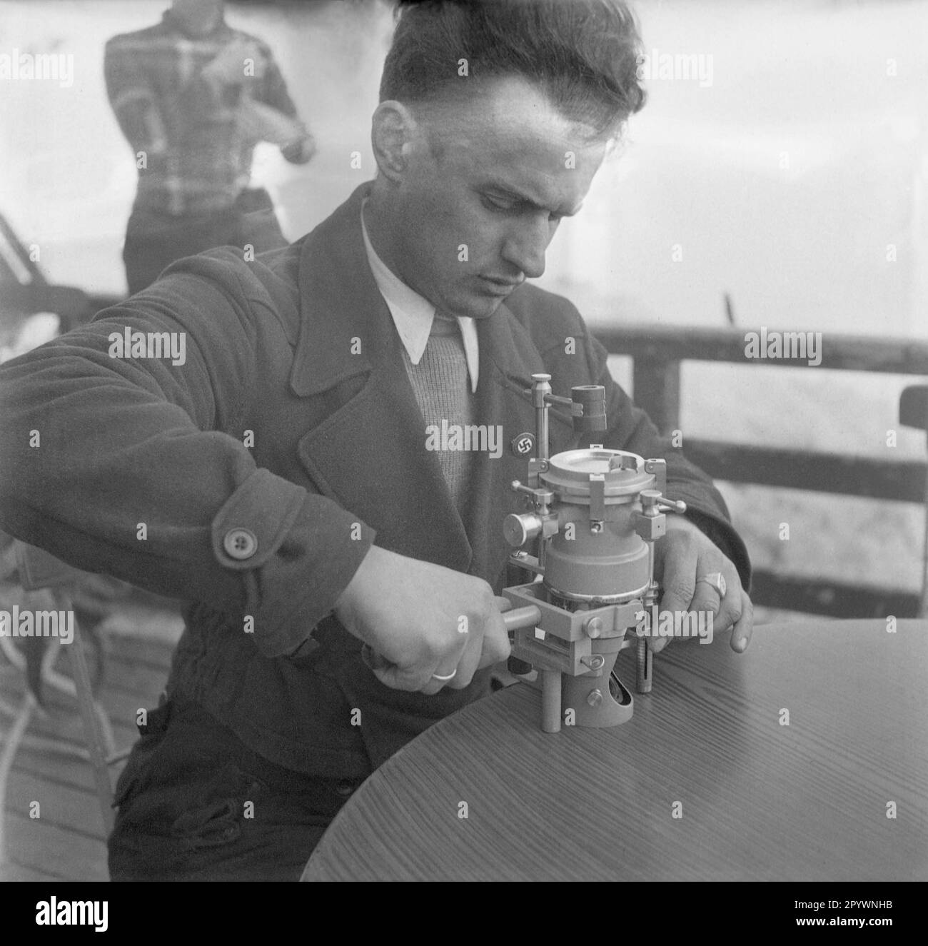A meterologist with a measuring device. Undated photo Stock Photo Alamy