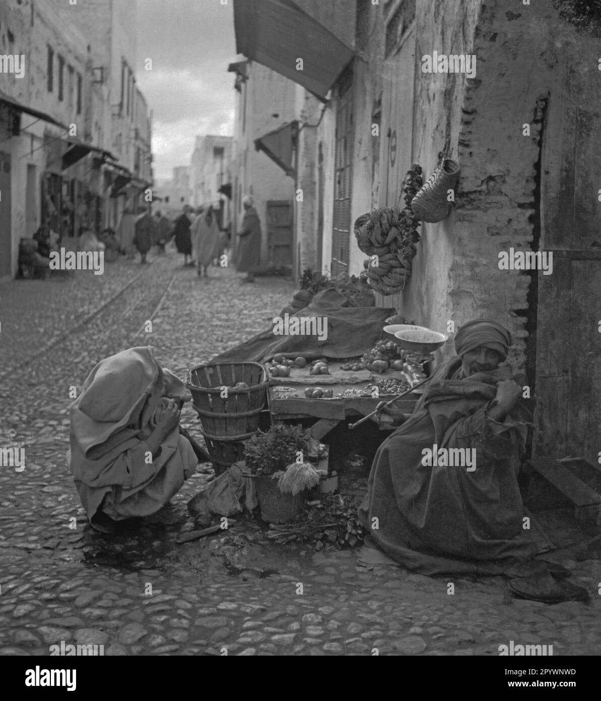 Man selling vegetables Black and White Stock Photos & Images - Alamy